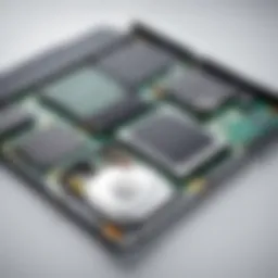 Disassembled laptop showcasing hard drive