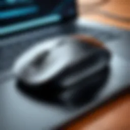 Close-up of a wireless mouse with a laptop in the background.